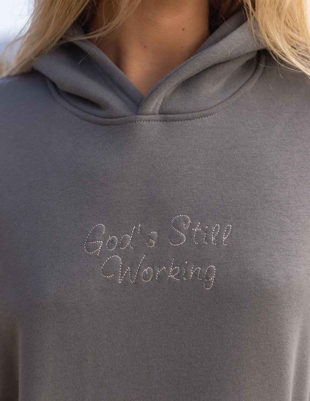 God's Still Working Unisex Hoodie